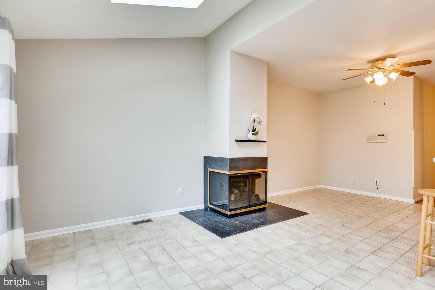 512 Kinsale Road Lutherville-Timonium, MD 21093 - Photo 10 of 37 Three sided fireplace