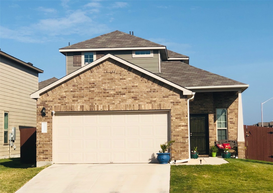 16022 Serene Fleming Trace Austin, TX 78728 - Photo 1 of 1 a view of a house with large windows