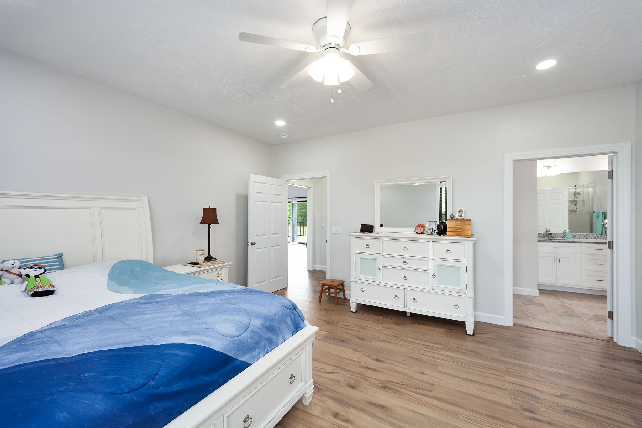 745 Alman Cemetery Road Paris, TN 38242 - Photo 13 of 31 a bedroom with a bed and a dresser