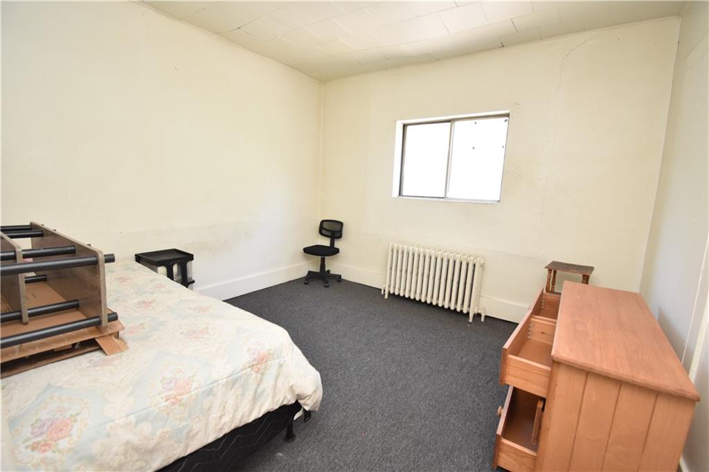 924 Island Avenue McKees Rocks, PA 15136 - Photo 24 of 29 a bedroom with bed and a window
