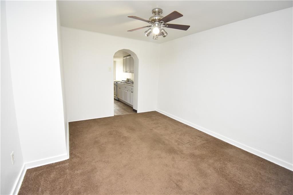 924 Island Avenue McKees Rocks, PA 15136 - Photo 10 of 29 a view of empty room with a ceiling fan