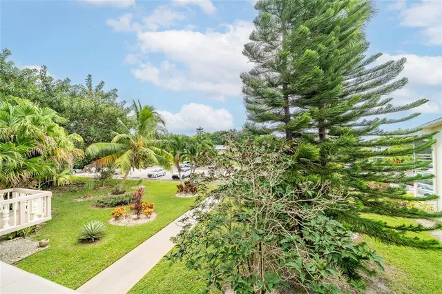 a view of a balcony with furniture