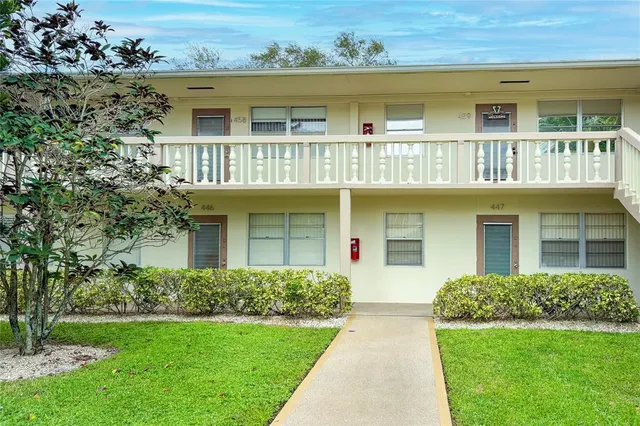 a front view of a house and a yard