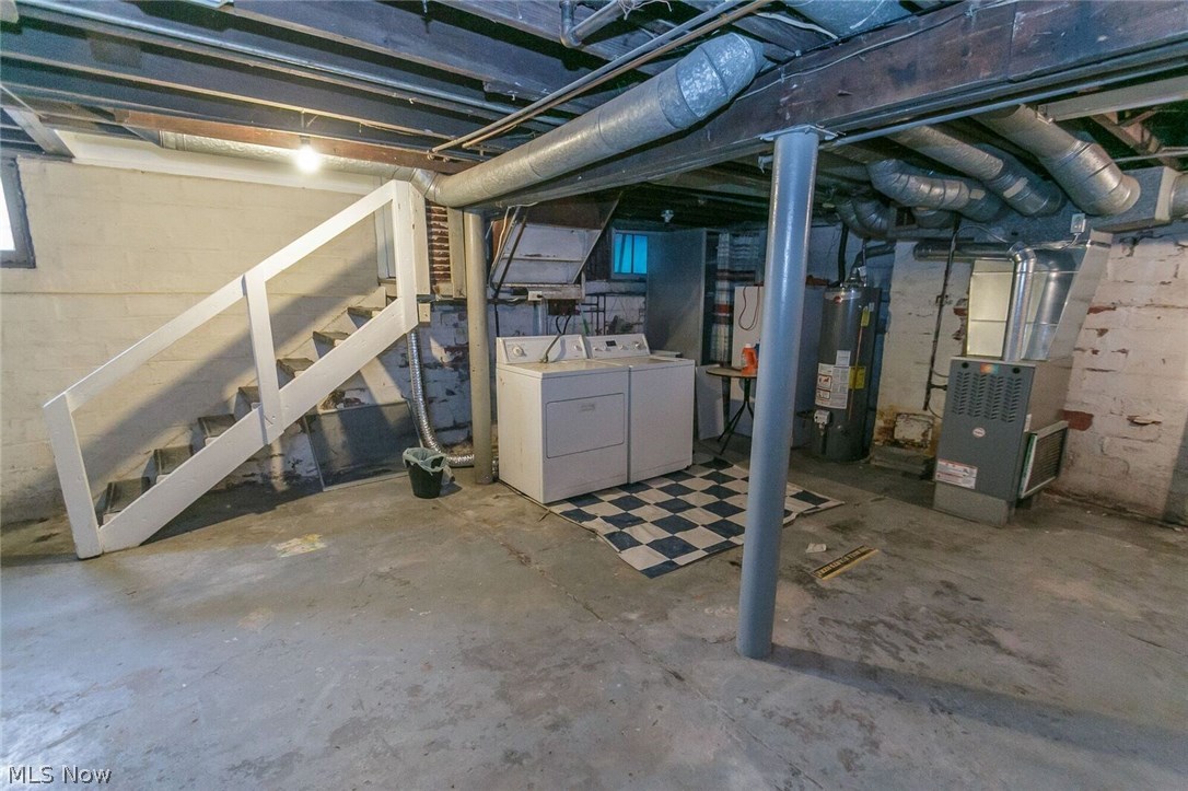 12909 Littleton Road Garfield Heights, OH 44125 - Photo 22 of 24 Basement with so much storage!