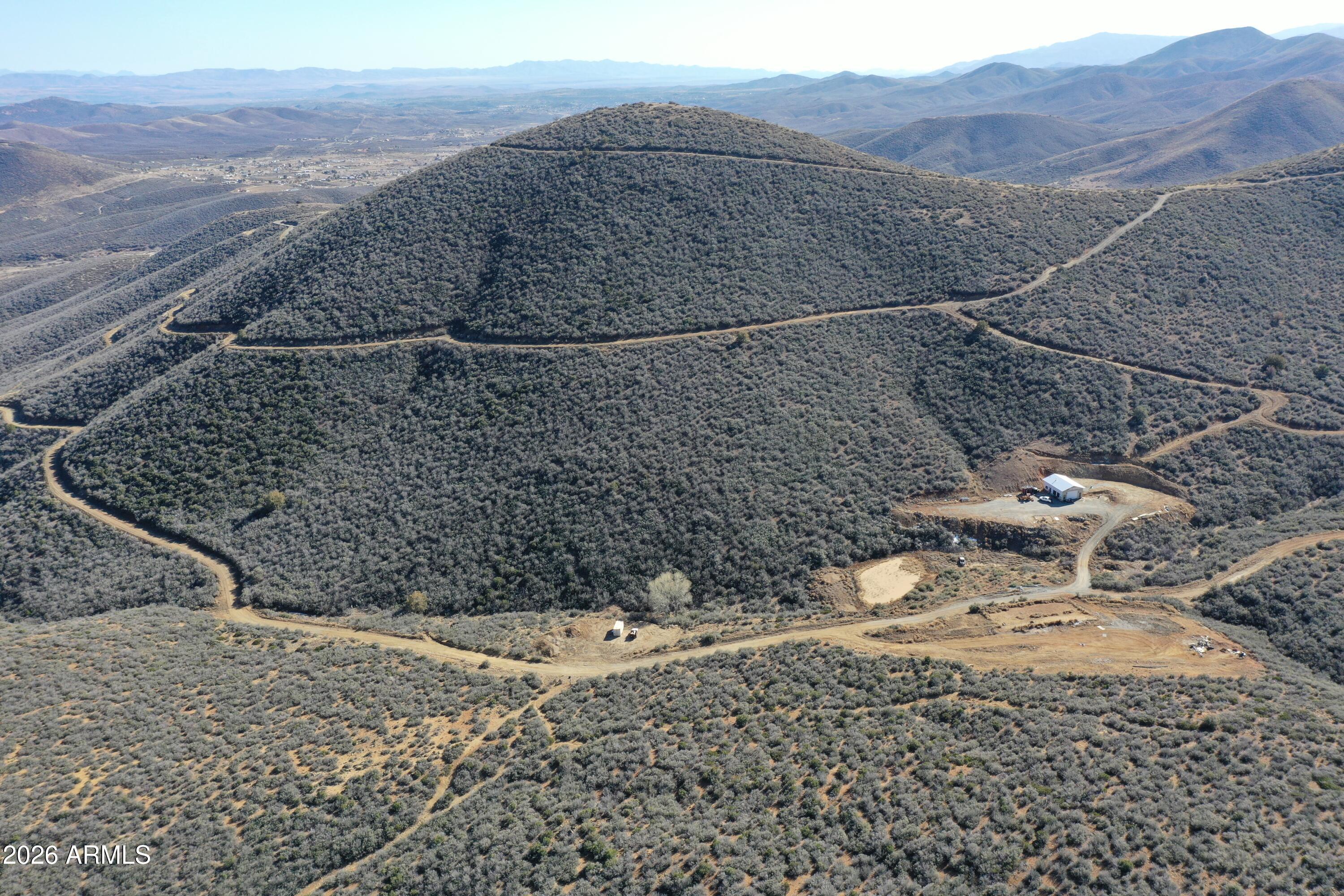 20 Miners Pick Road, Unit 20 Mayer, AZ 86333 - Photo 13 of 64 a view of a backyard with wooden fence
