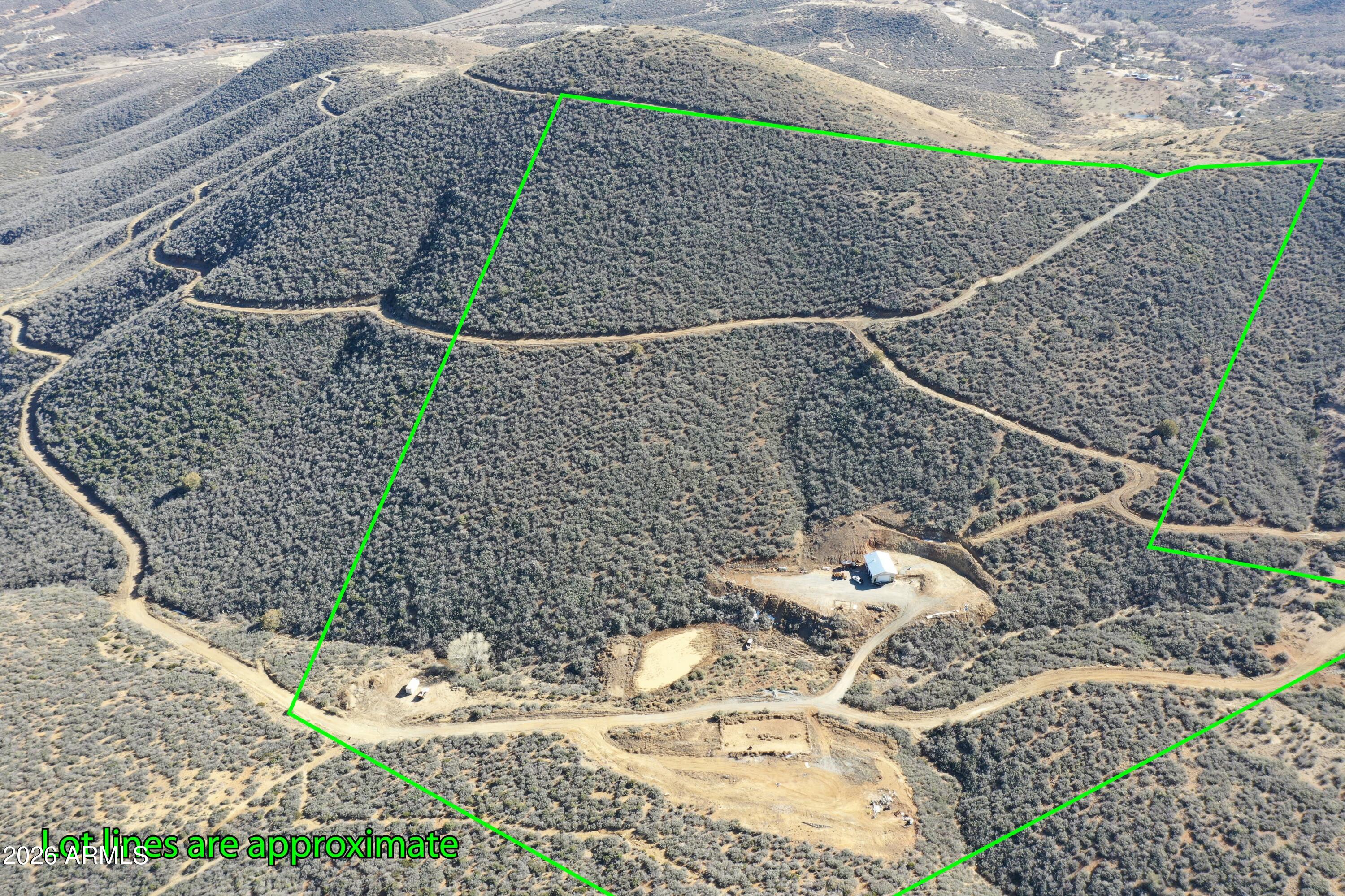 20 Miners Pick Road, Unit 20 Mayer, AZ 86333 - Photo 3 of 64 a view of roof