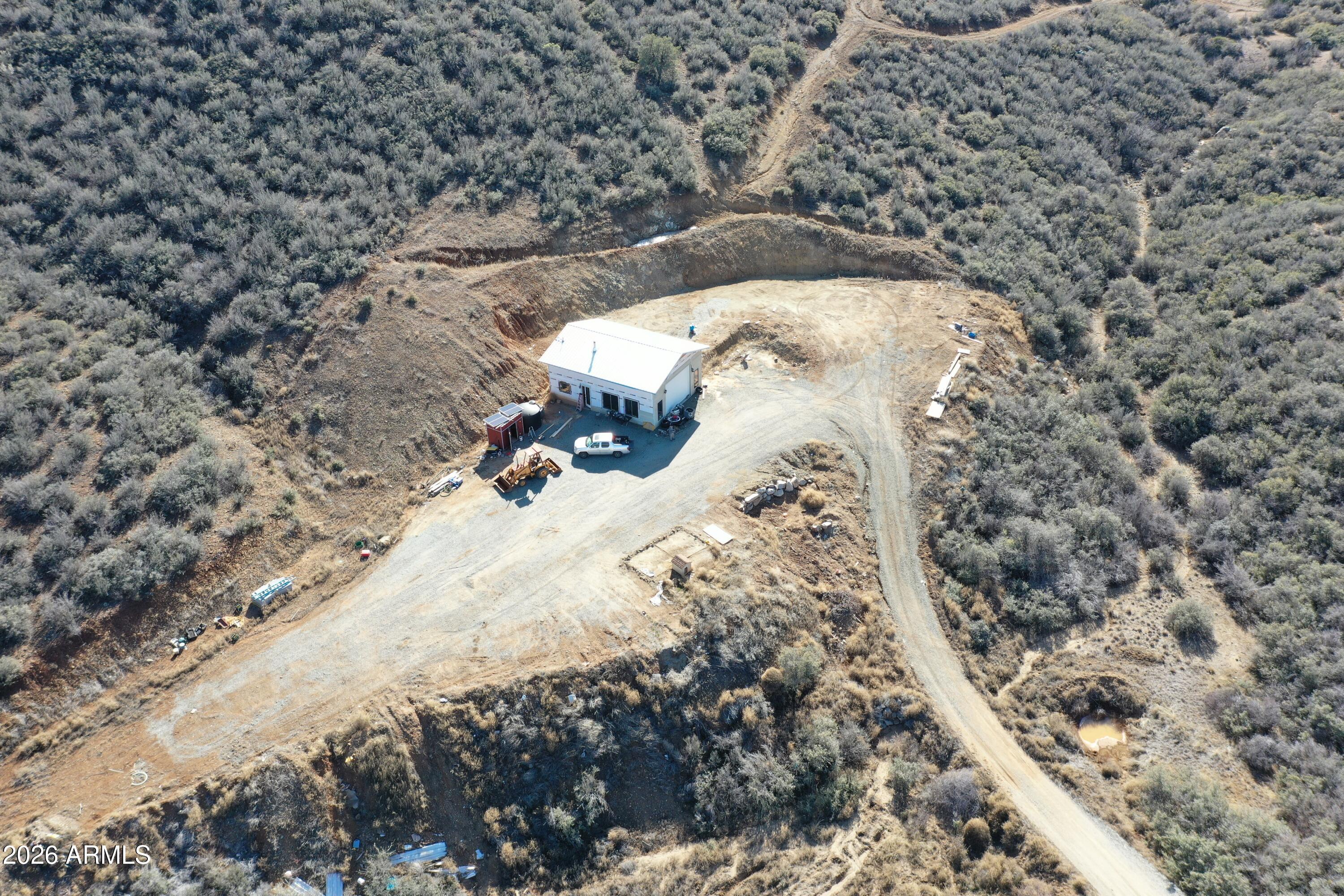 20 Miners Pick Road, Unit 20 Mayer, AZ 86333 - Photo 38 of 64 view of a dry yard with wooden fence
