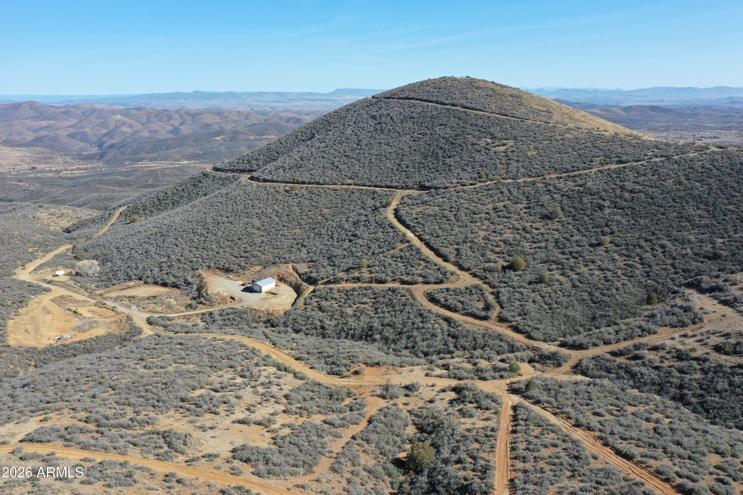 20 Miners Pick Road, Unit 20 Mayer, AZ 86333 - Photo 9 of 64 a view of roof and wooden floor