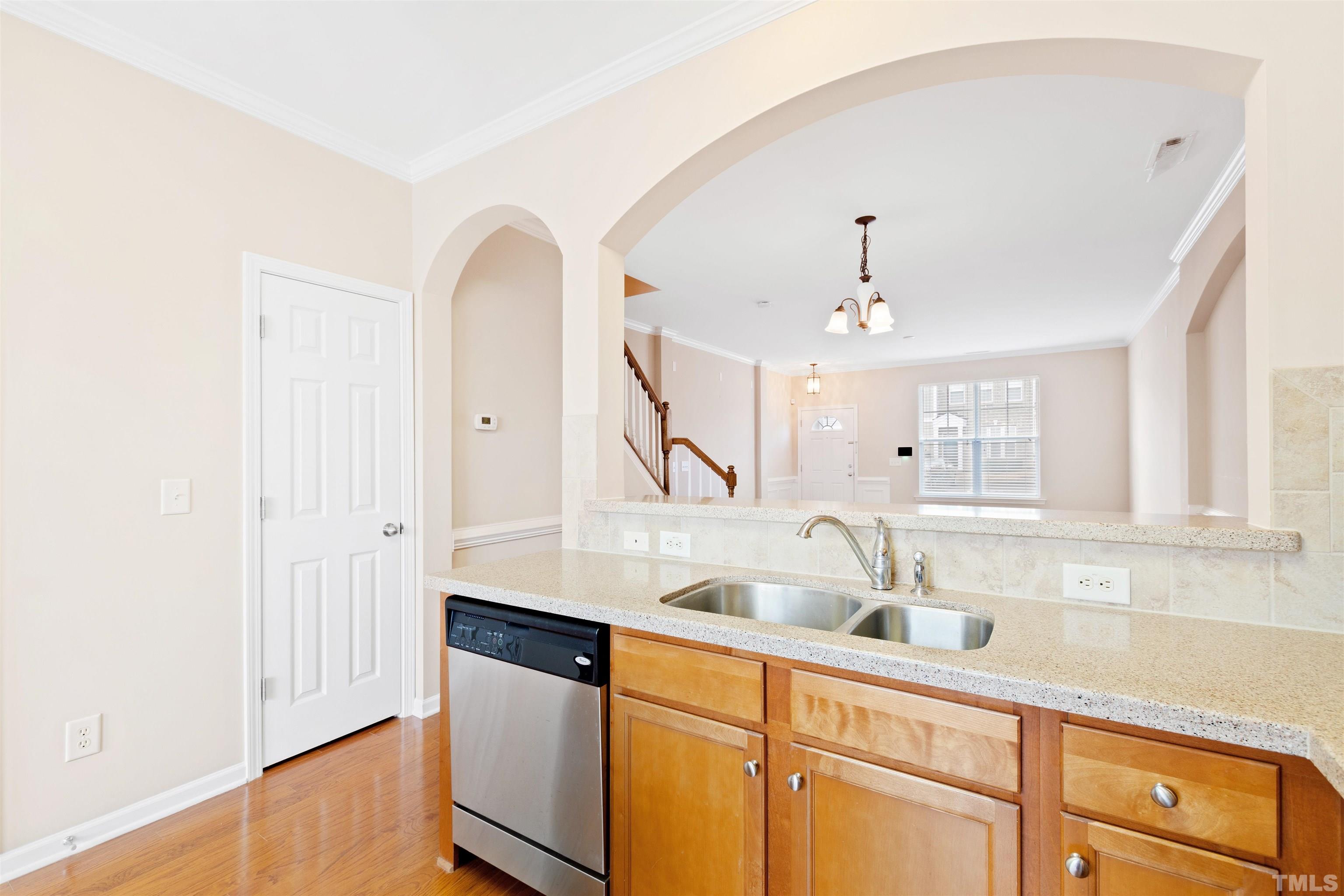 2962 Casona Way Raleigh, NC 27616 - Photo 14 of 40 a kitchen with sink and cabinets