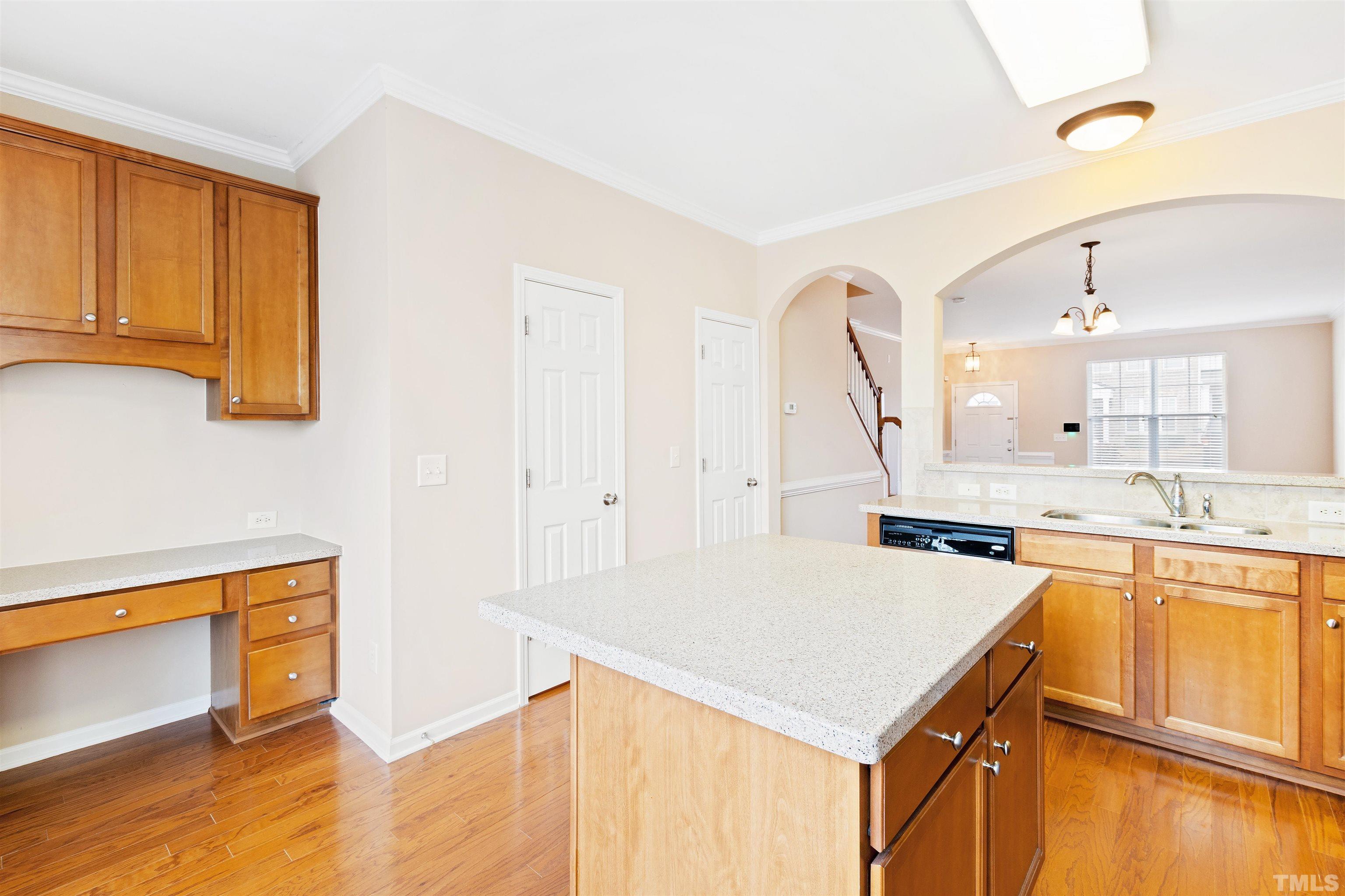 2962 Casona Way Raleigh, NC 27616 - Photo 18 of 40 a kitchen that has a sink a stove and a window
