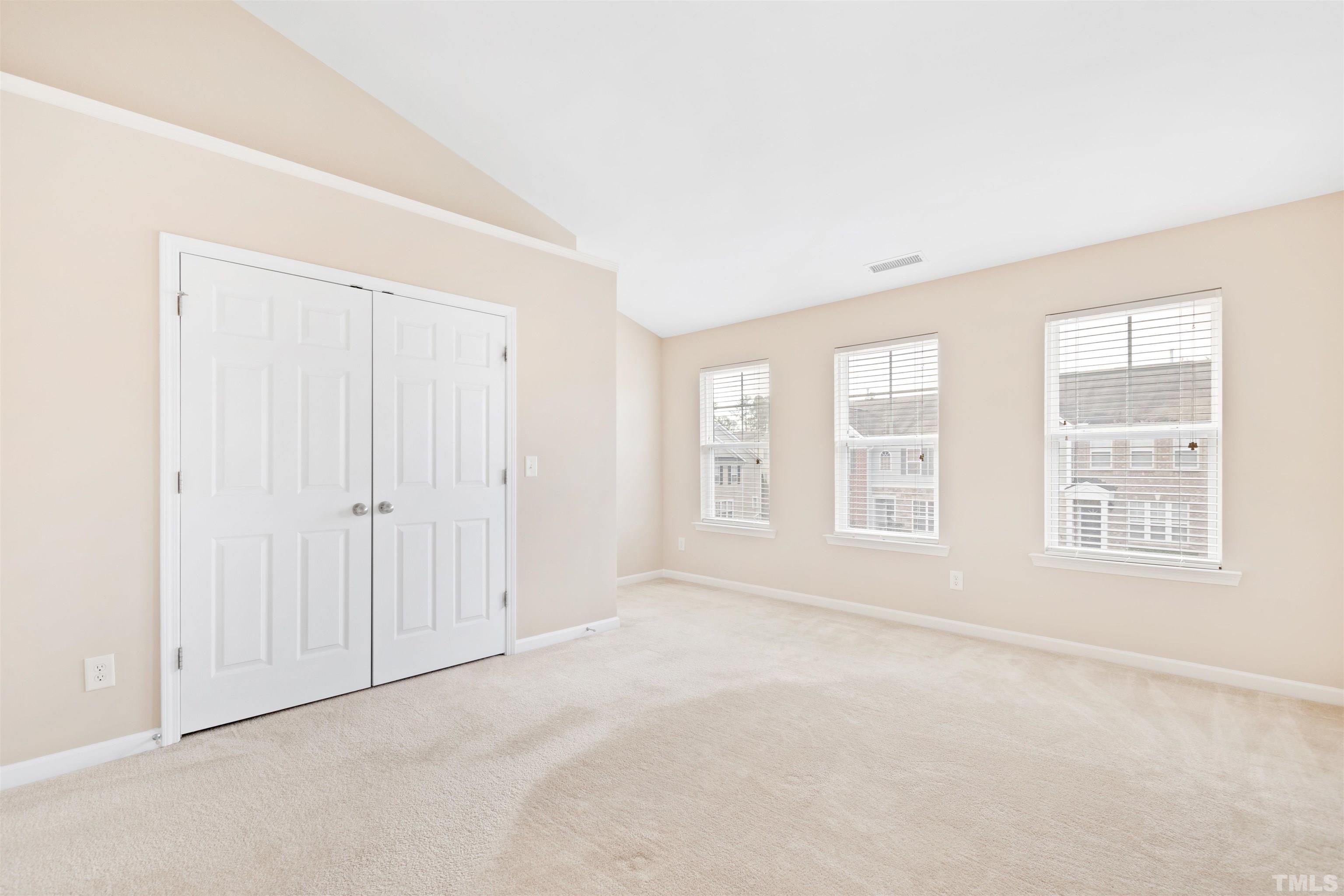 2962 Casona Way Raleigh, NC 27616 - Photo 23 of 40 an empty room with windows