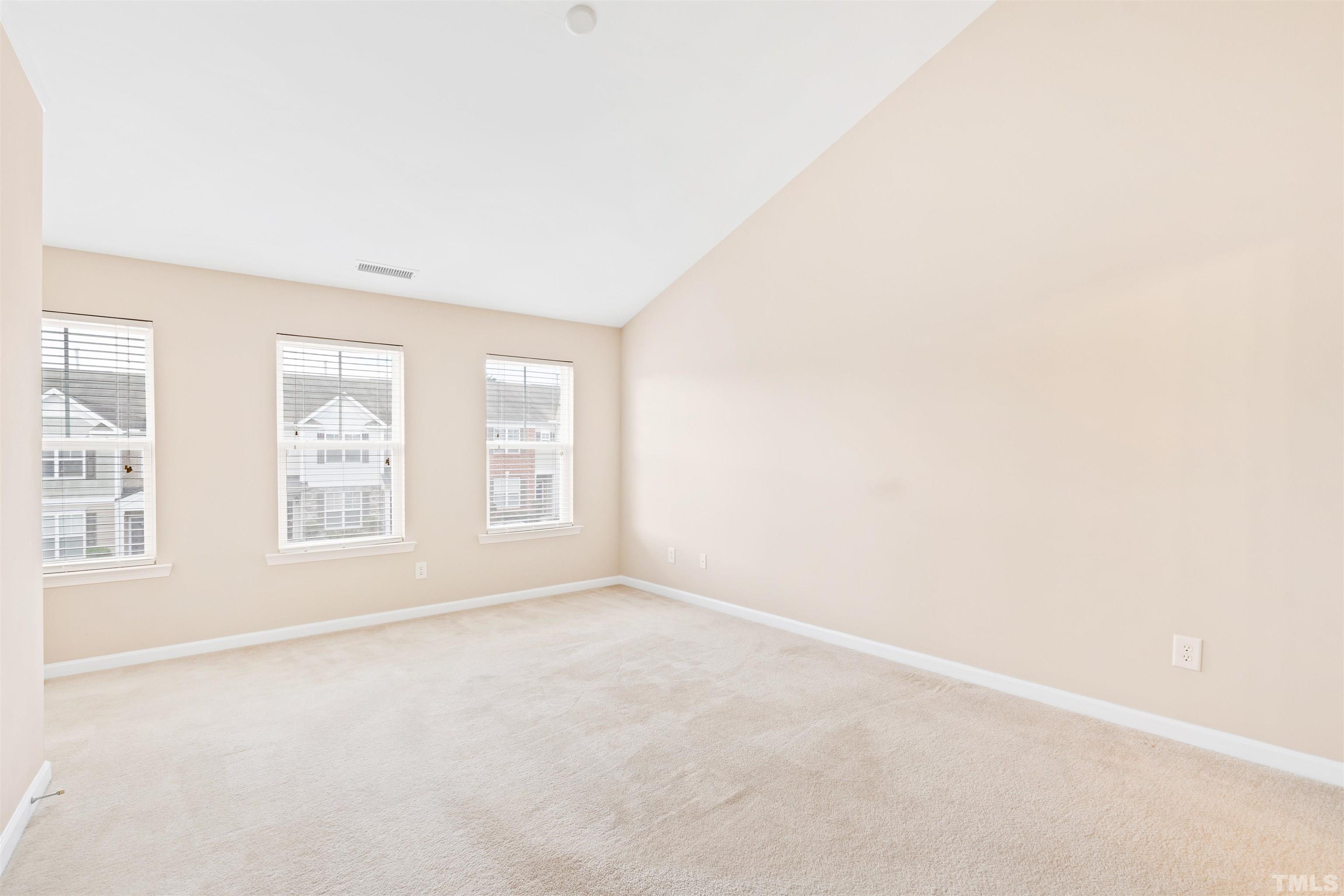2962 Casona Way Raleigh, NC 27616 - Photo 25 of 40 an empty room with a window