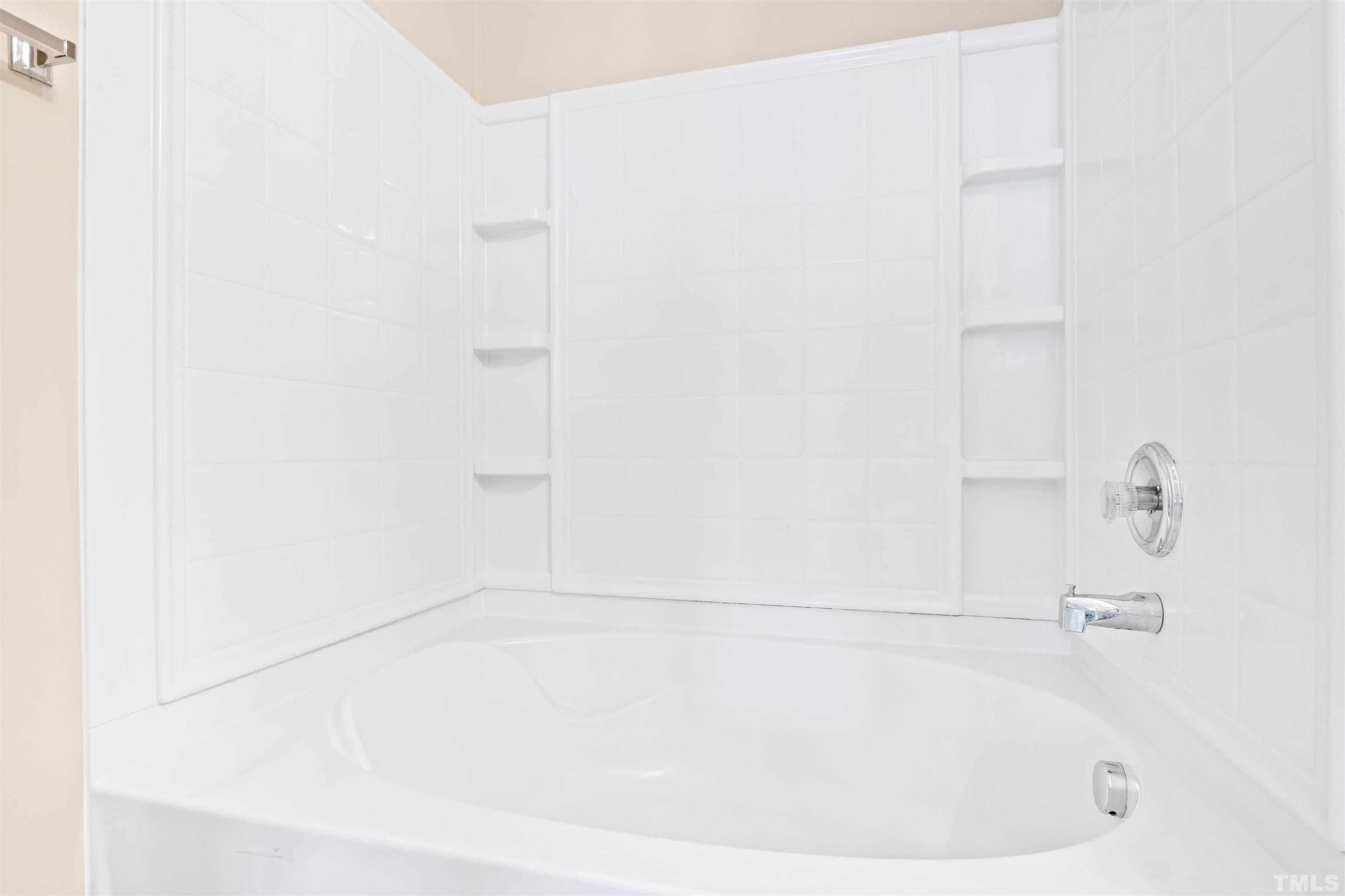 2962 Casona Way Raleigh, NC 27616 - Photo 29 of 40 a bathroom with a bathtub