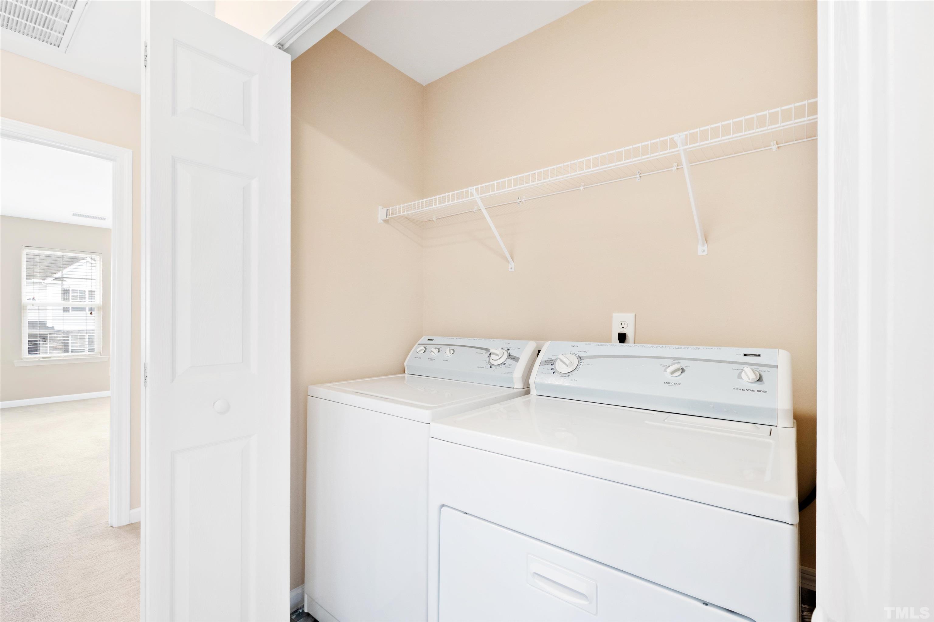 2962 Casona Way Raleigh, NC 27616 - Photo 33 of 40 a utility room with dryer and washer