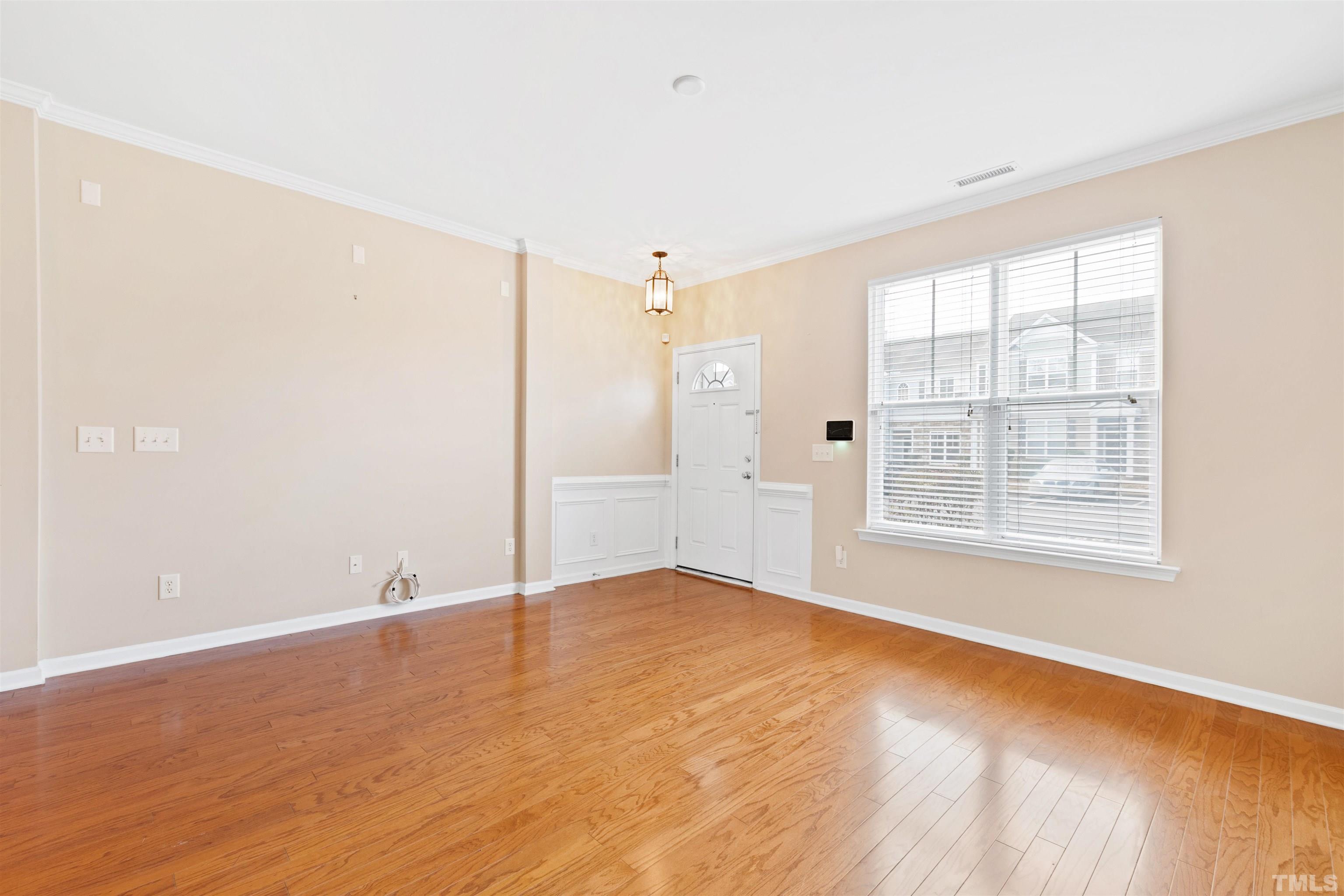 2962 Casona Way Raleigh, NC 27616 - Photo 7 of 40 a view of an empty room with a window