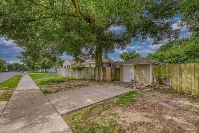 a view of a house with a big yard