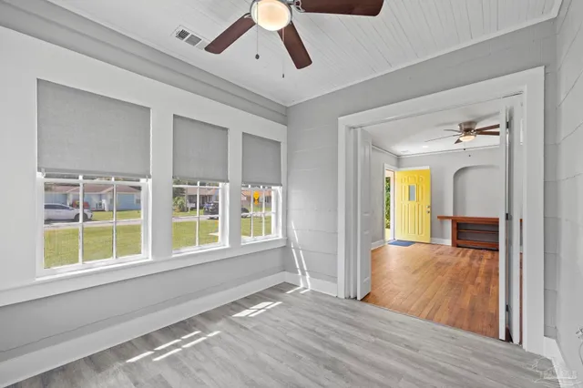 a view of an empty room and window