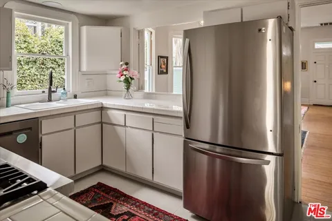 a bathroom with a shower and a bath tub
