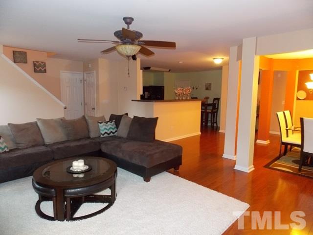 1621 Extine Lane Raleigh, NC 27610 - Photo 5 of 25 a living room with furniture and a flat screen tv