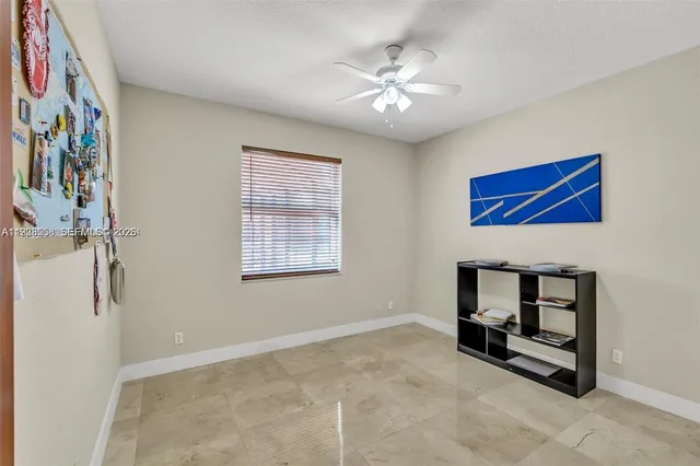 a bathroom with a sink a toilet and bathtub