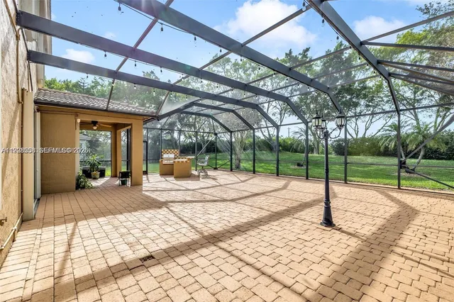a view of a swimming pool with a patio