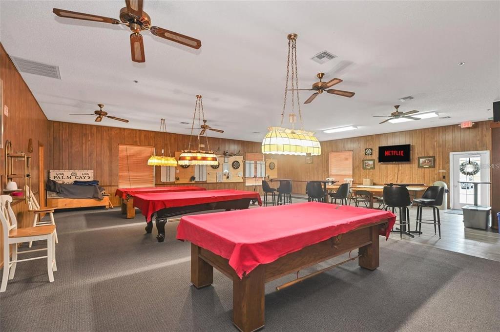 10838 Southwest 78th Court Ocala, FL 34476 - Photo 22 of 32 a living room with furniture and pool table