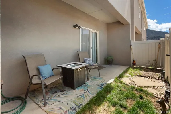 a bedroom with a bed and a chair