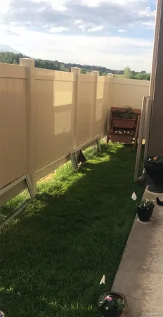 a view of a lake with a big yard