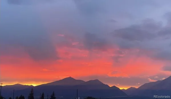 a view of house with mountain view