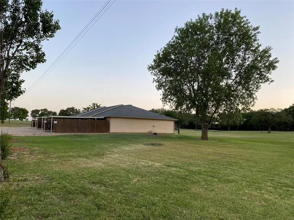 a view of a lake from a yard