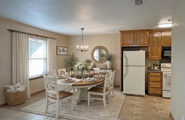 a view of a dining room with furniture