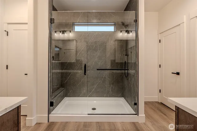 a bathroom with a bath tub