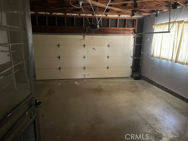 a view of storage and utility room