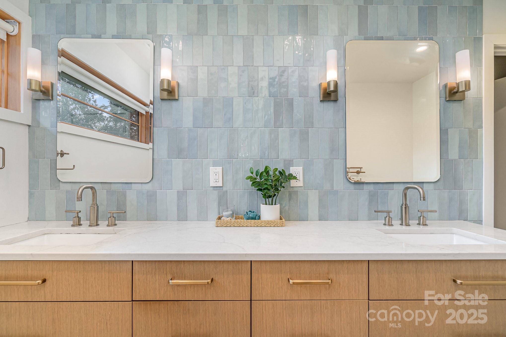 4833 Addison Drive Charlotte, NC 28211 - Photo 12 of 47 a bathroom with a sink and a mirror