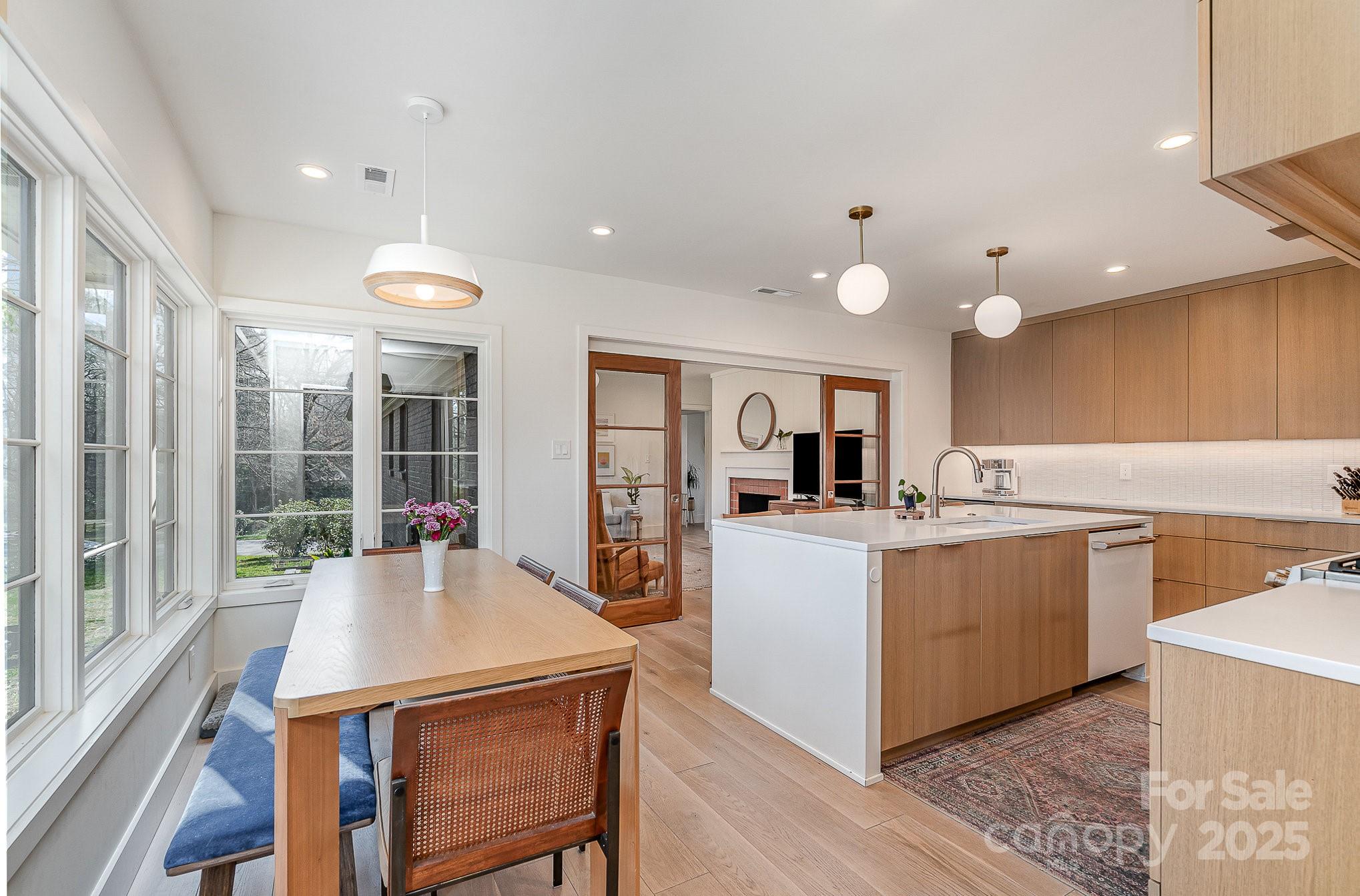4833 Addison Drive Charlotte, NC 28211 - Photo 21 of 47 a view of kitchen with sink and living room