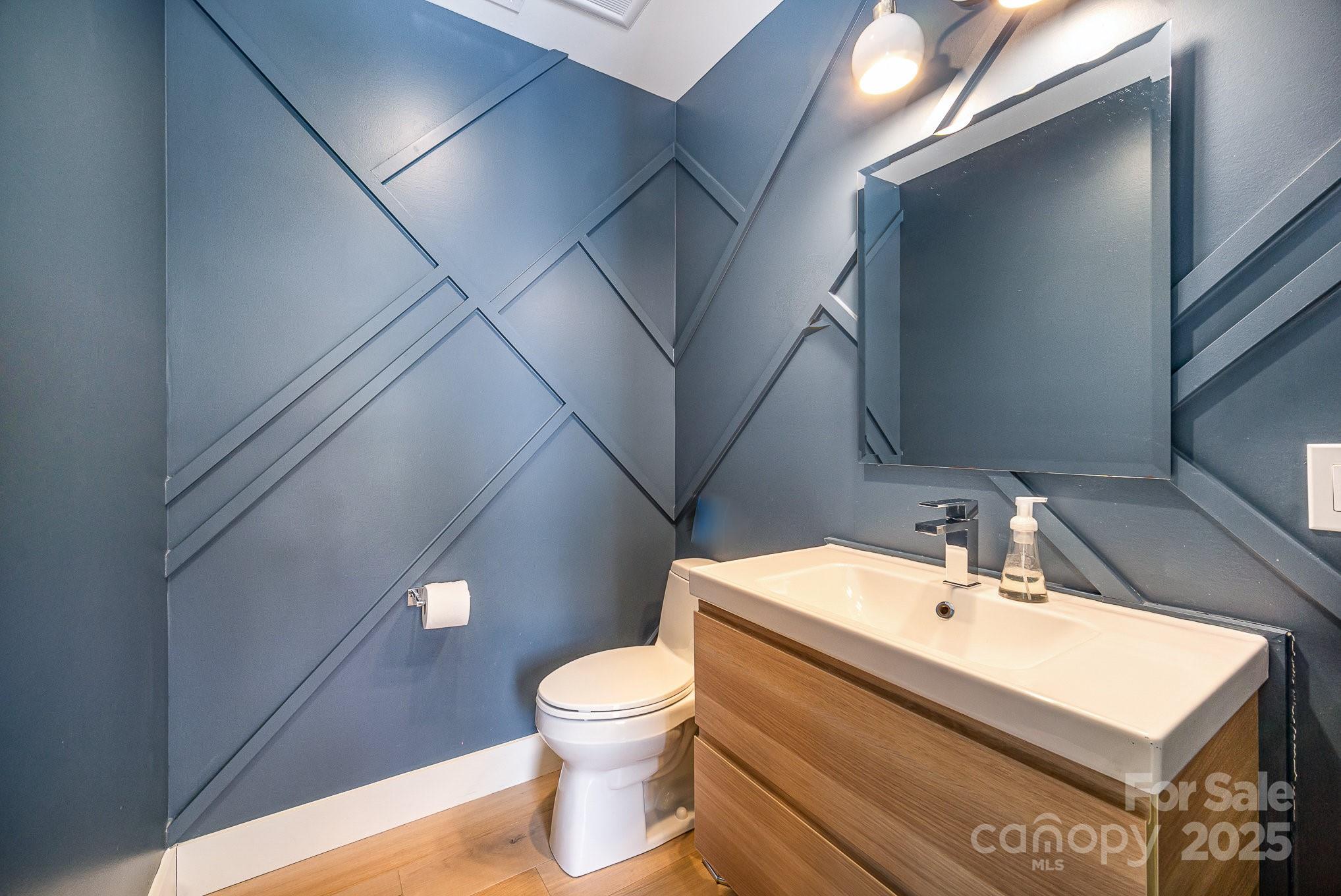 4833 Addison Drive Charlotte, NC 28211 - Photo 25 of 47 a bathroom with a sink and a toilet