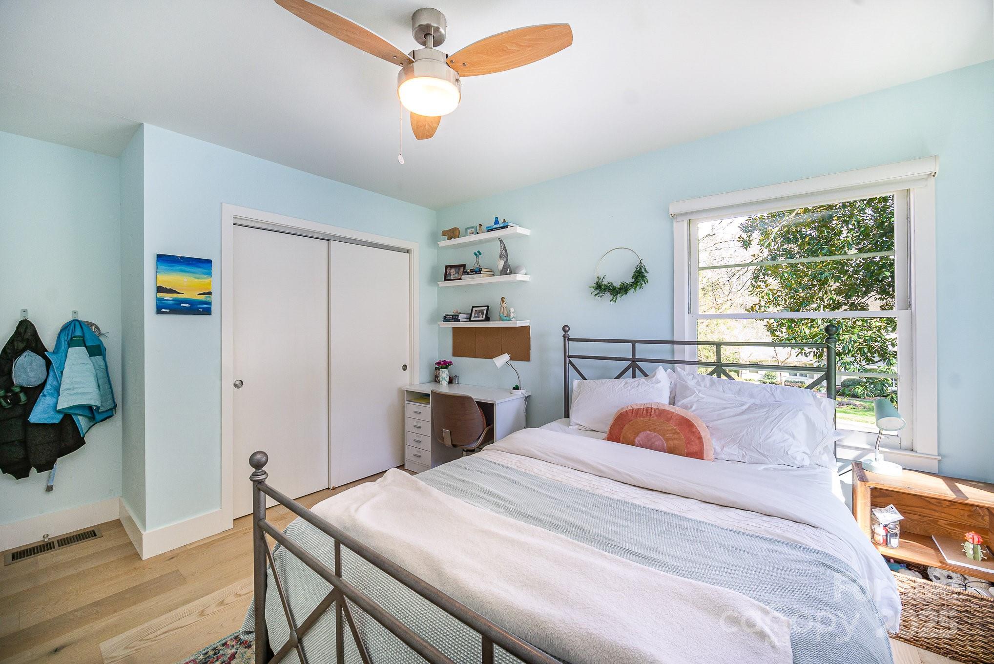 4833 Addison Drive Charlotte, NC 28211 - Photo 34 of 47 a bedroom with a bed and a dresser