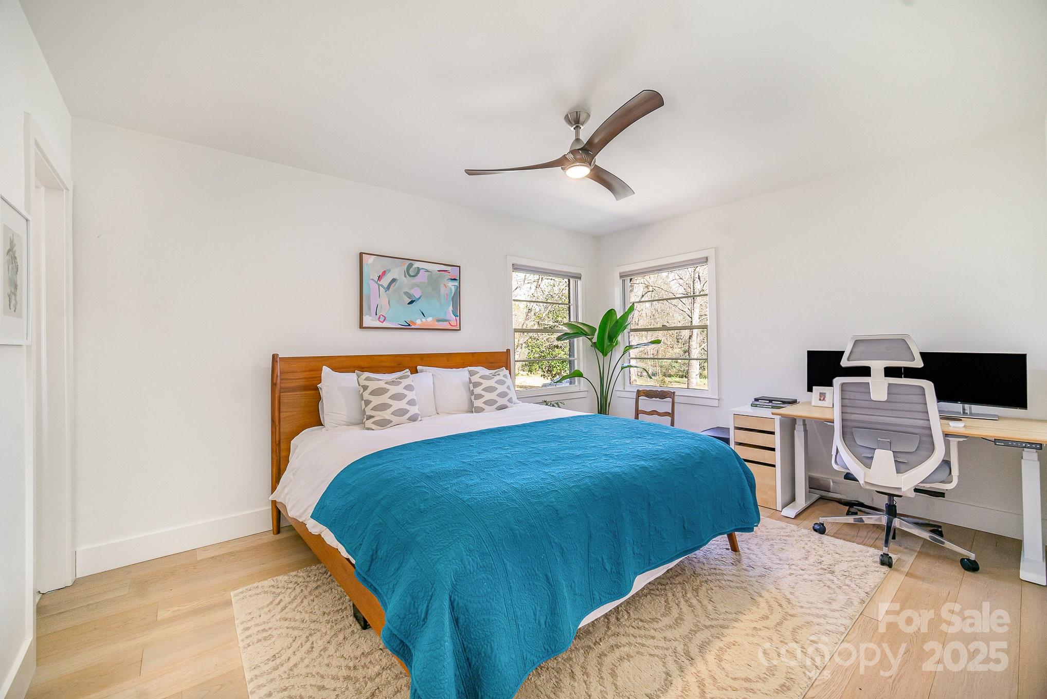 4833 Addison Drive Charlotte, NC 28211 - Photo 35 of 47 a bedroom with two beds and a desk