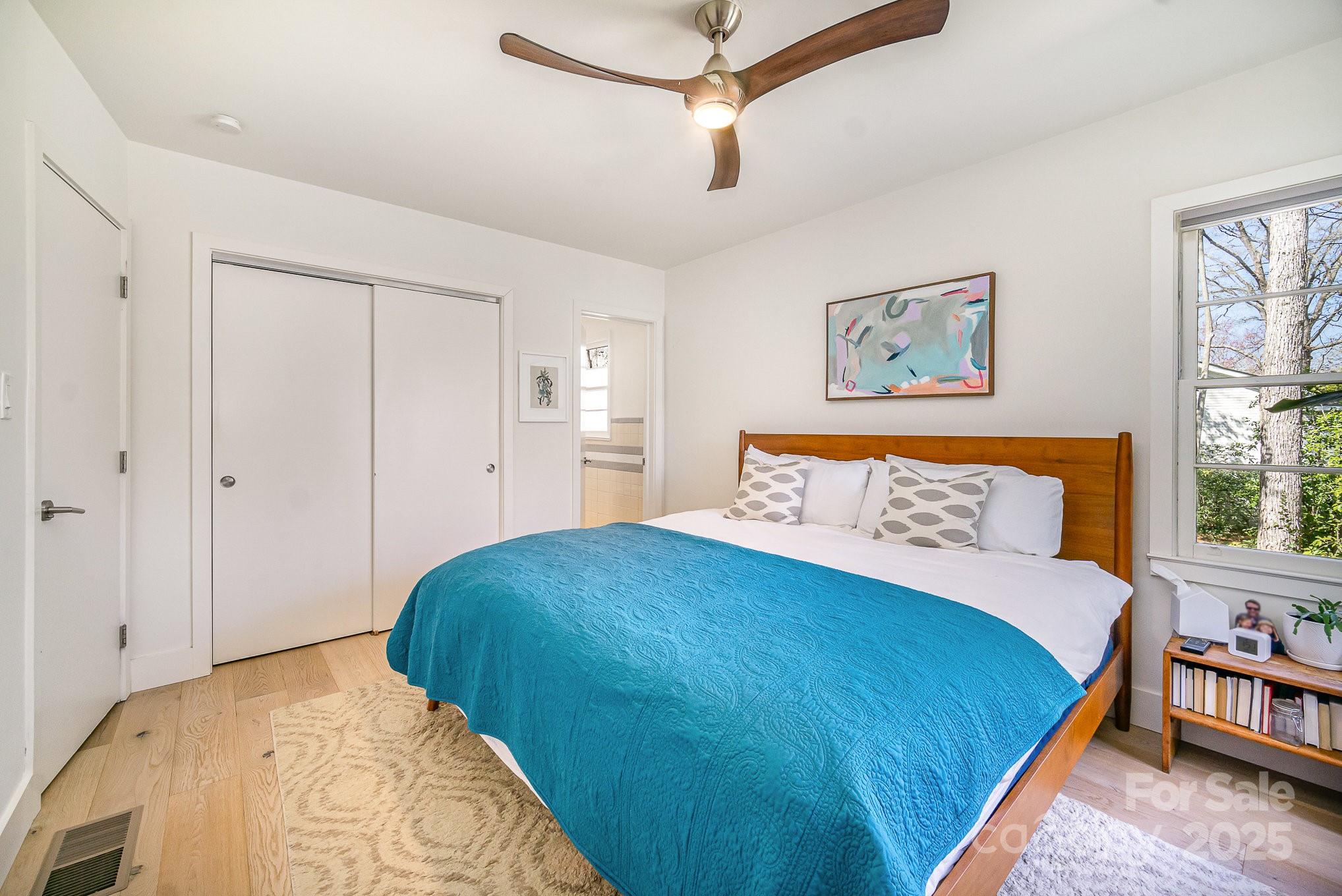 4833 Addison Drive Charlotte, NC 28211 - Photo 36 of 47 a bedroom with a bed and a window