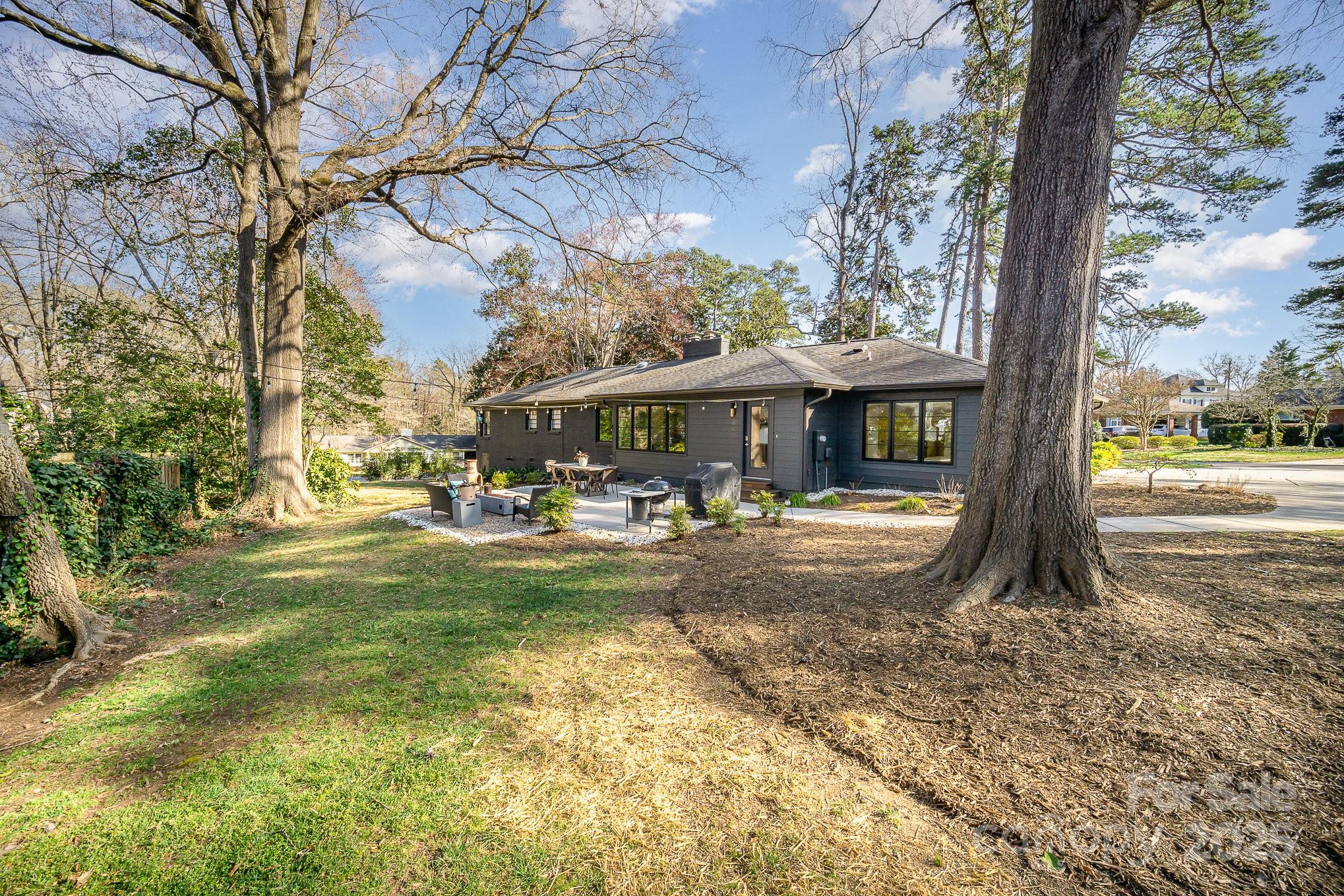 4833 Addison Drive Charlotte, NC 28211 - Photo 40 of 47 a view of a house with a yard
