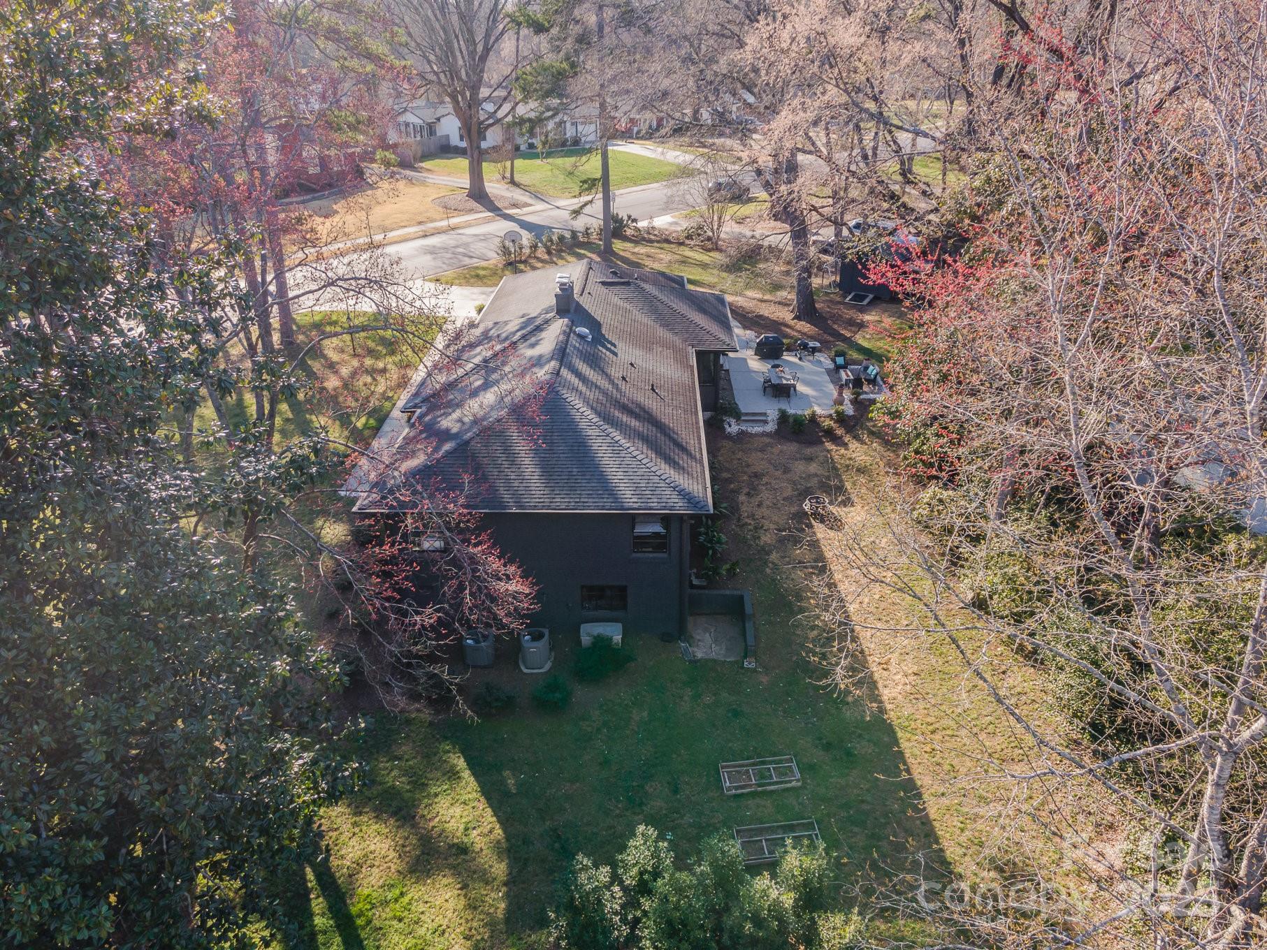 4833 Addison Drive Charlotte, NC 28211 - Photo 45 of 47 a backyard of a house with lots of green space