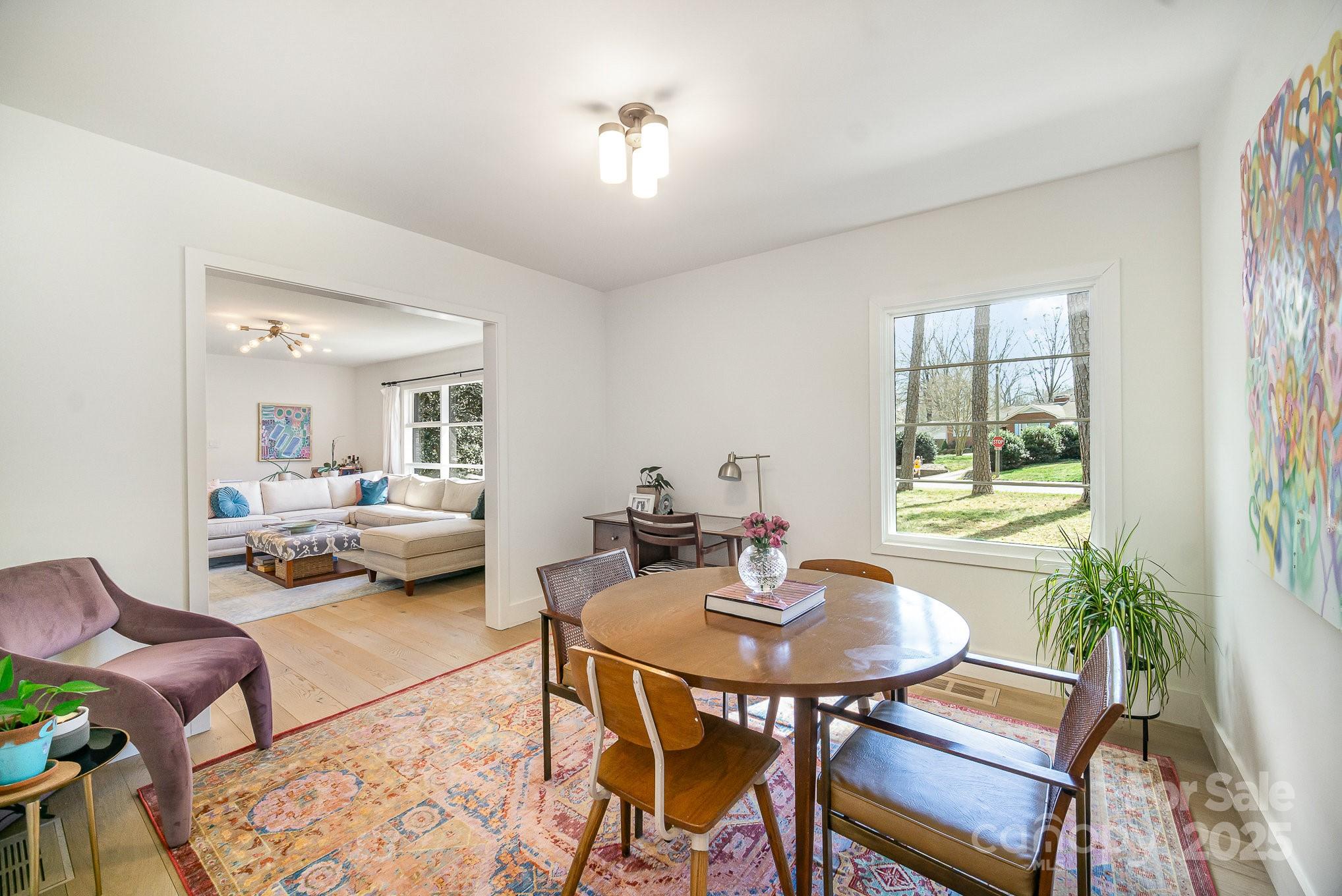 4833 Addison Drive Charlotte, NC 28211 - Photo 9 of 47 a living room with furniture and a table