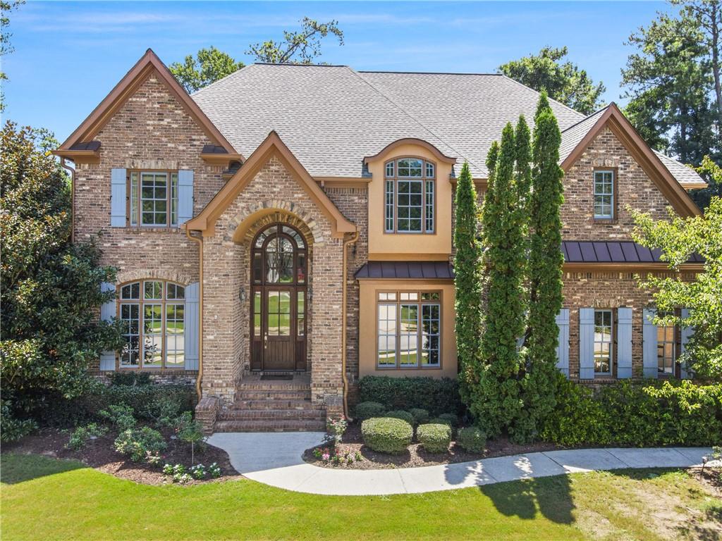 2831 Laurelgate Drive Decatur, GA 30033 - Photo 1 of 1 a front view of a house with yard and green space
