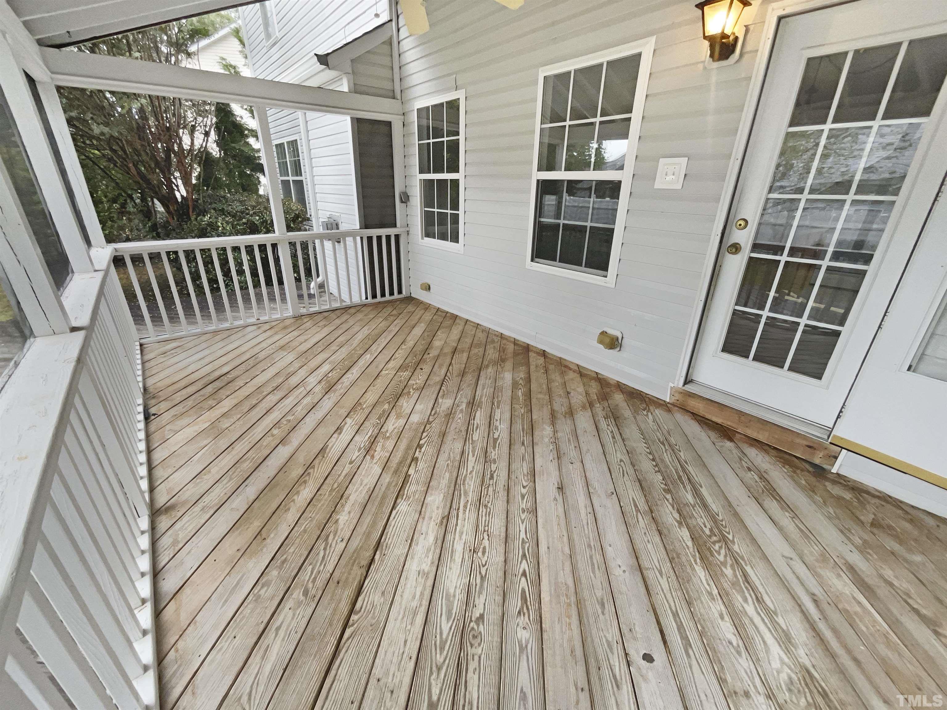 5408 Neuse Planters Court Raleigh, NC 27616 - Photo 16 of 17 a view of backyard with deck and wooden floor