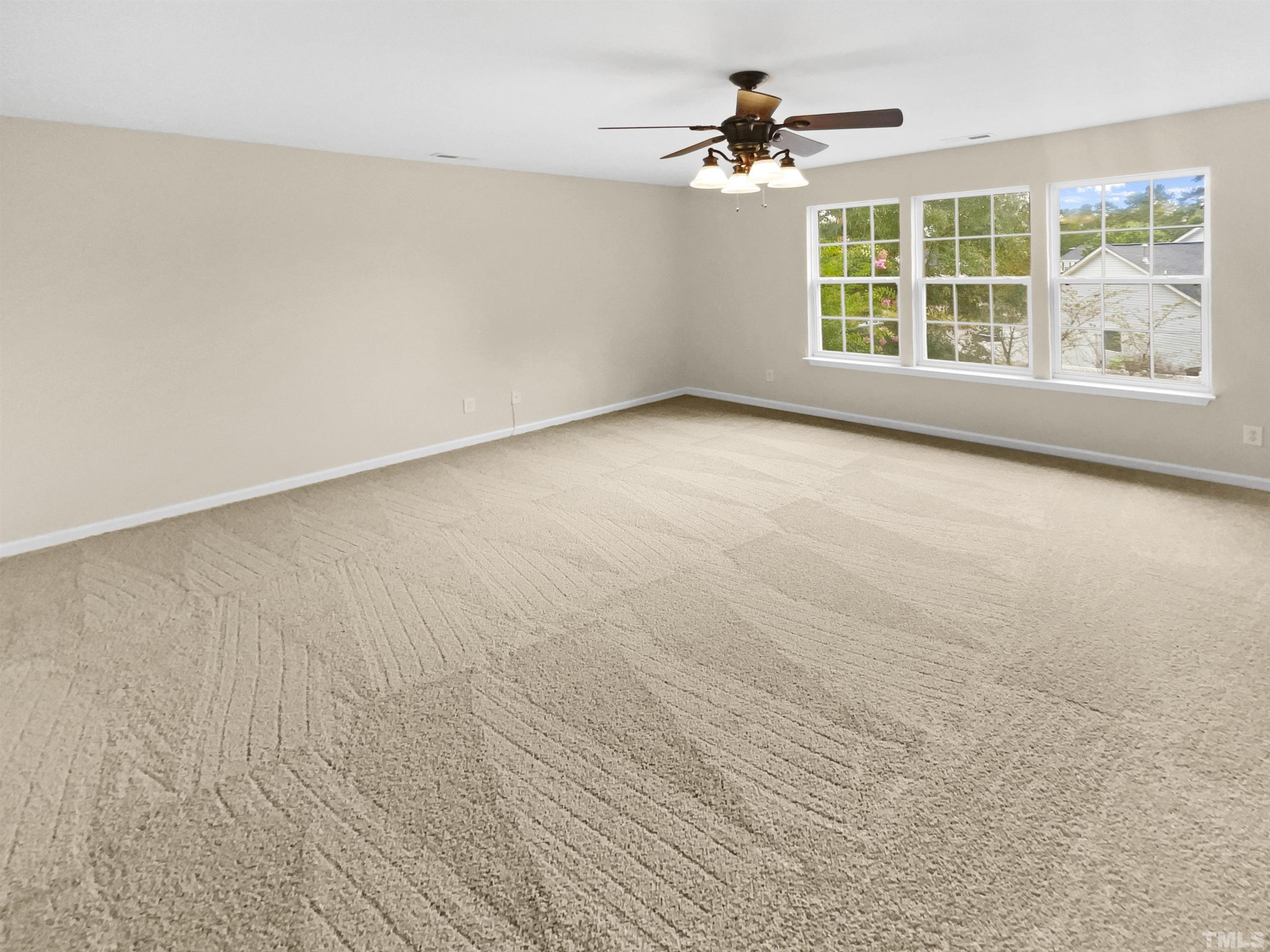 5408 Neuse Planters Court Raleigh, NC 27616 - Photo 3 of 17 a view of an empty room with a window