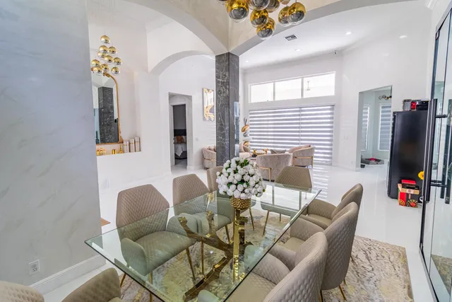 a work room with furniture and a window