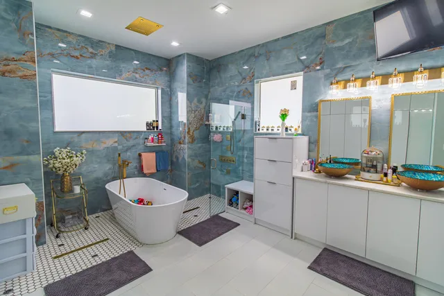 a utility room with sink dryer and washer