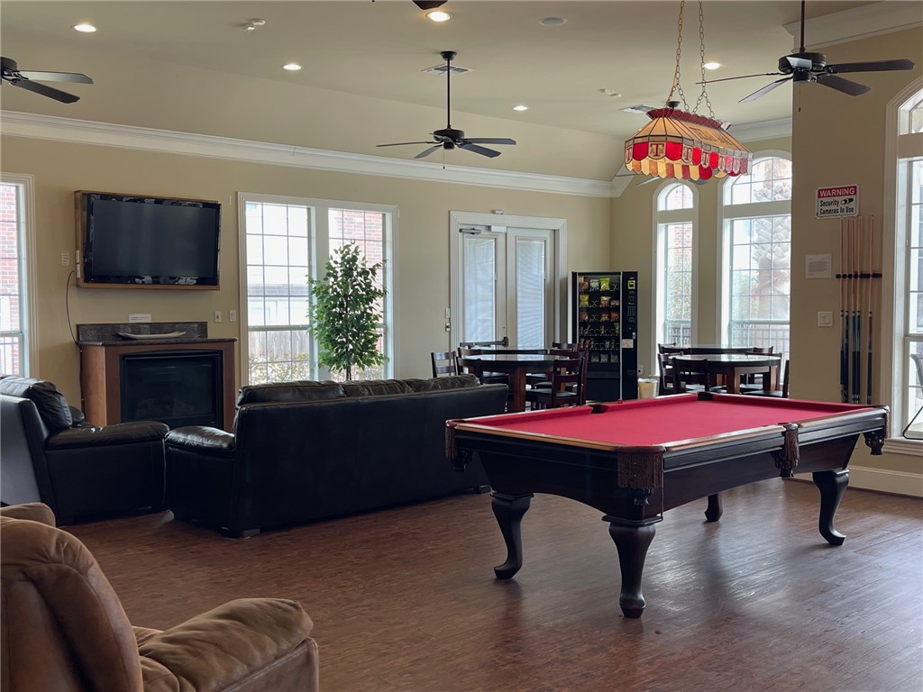 1198 Jones-Butler Road, Unit 2706 College Station, TX 77840 - Photo 14 of 17 a room with furniture pool table flat screen tv and windows