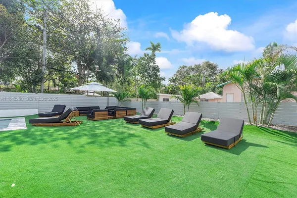 a view of an outdoor space with a swimming pool