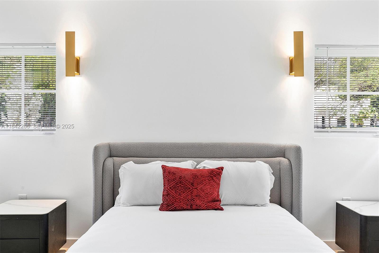 58 Northeast 45th Street Miami, FL 33137 - Photo 36 of 55 a bedroom with a bed and a window